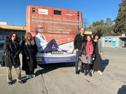 The Greek team with their patron (the popular basketball player Bane Prelevic) and project advertisement on a public bus. greek-partners-with-patron